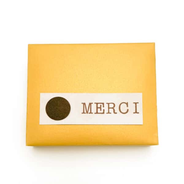 Goldstück mit Goldhülle "Merci"<br> 9 Stück